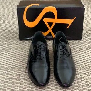 Men’s Stacy Adam’s black oxfords.